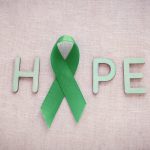 Green Ribbon with HOPE word, cancer awareness, Liver, kidney cancer awareness